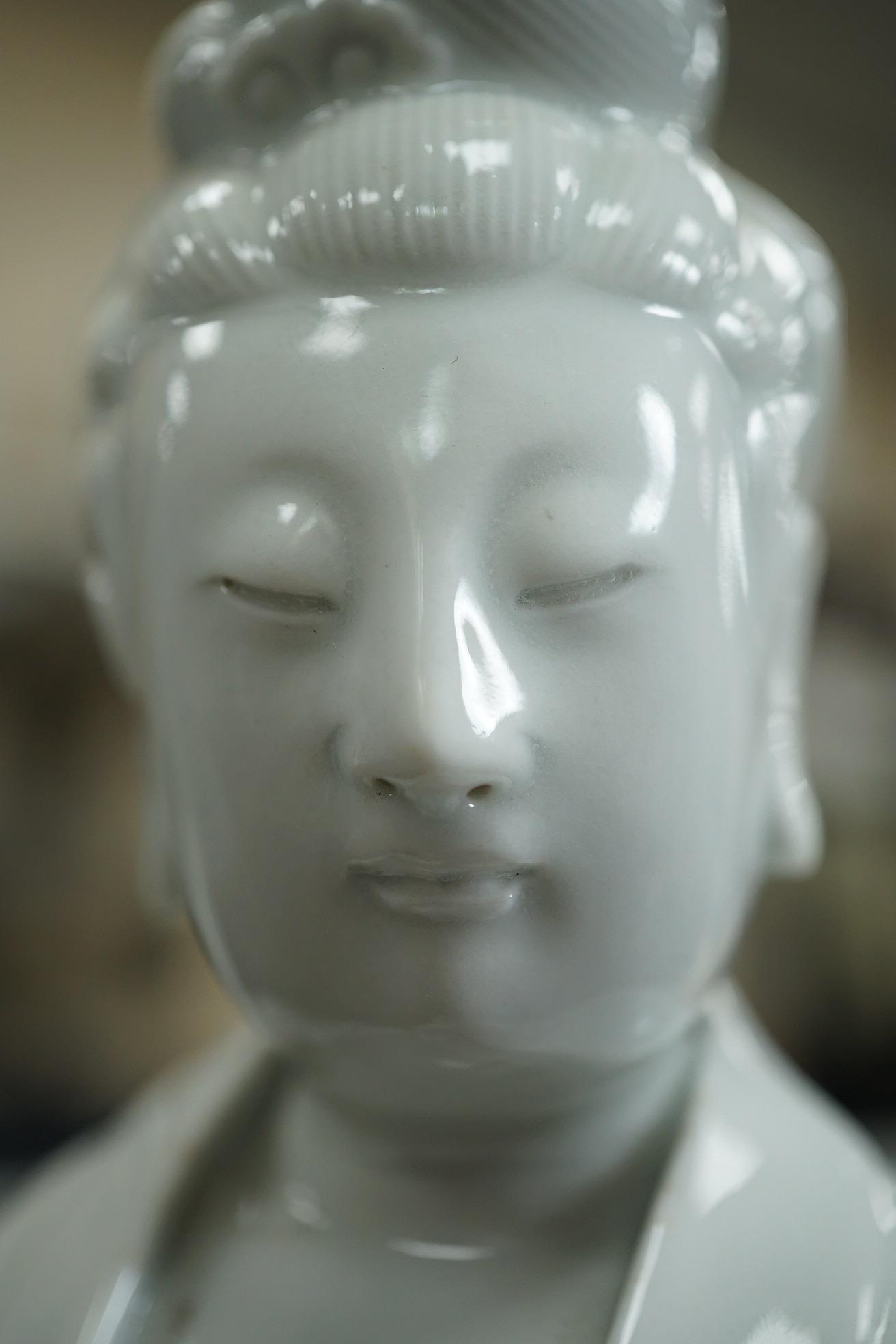 A Chinese blanc-de-chine seated figure of Guanyin, late 19th/early 20th century